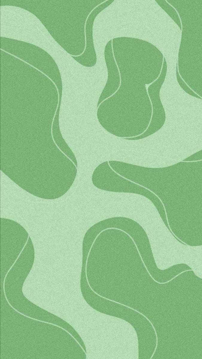 A Green Rug With A Pattern Of Waves
