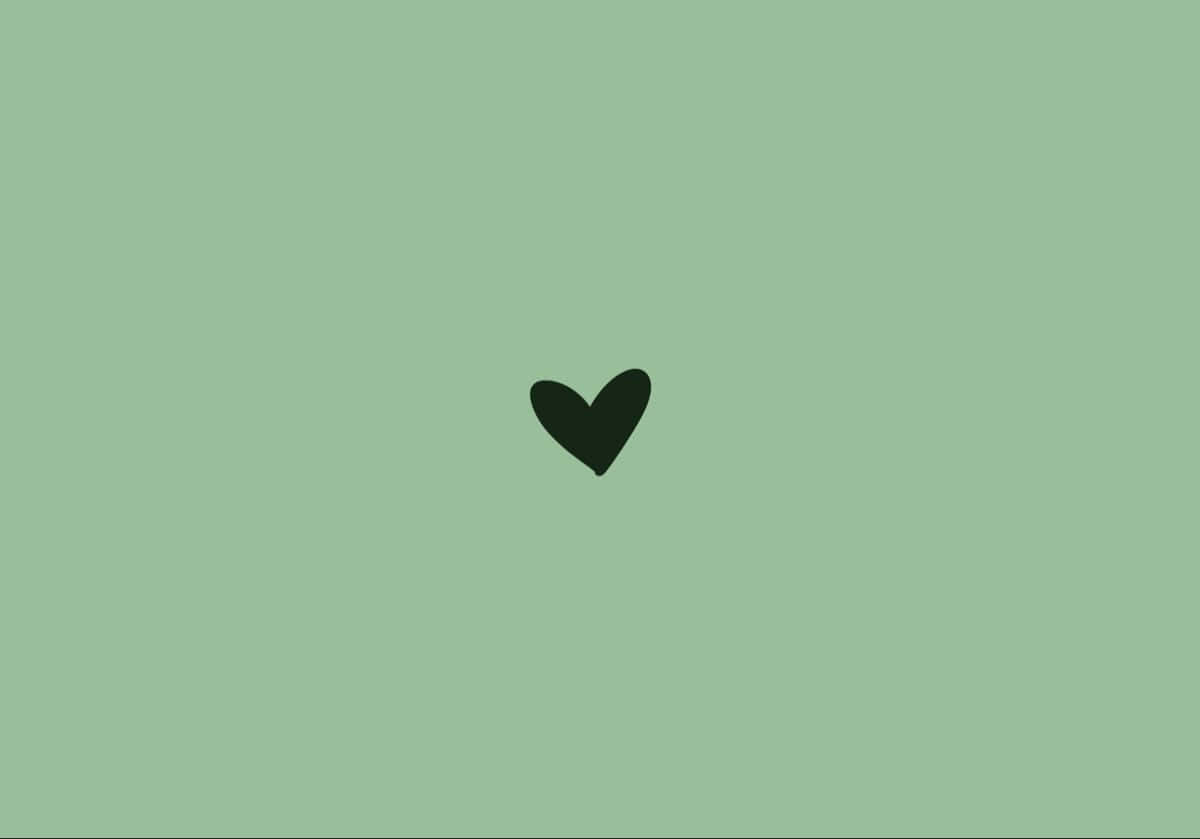 Sage Green Backgroundwith Black Heart Wallpaper