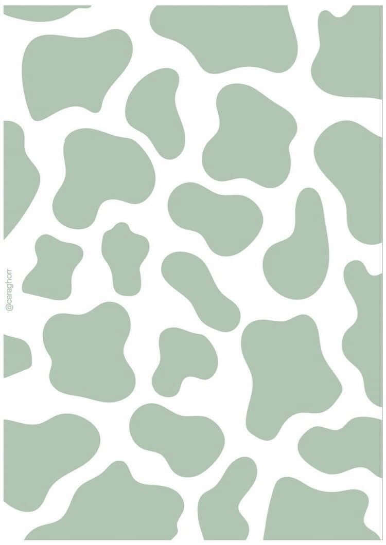 A Green And White Cow Print Pattern On A White Background