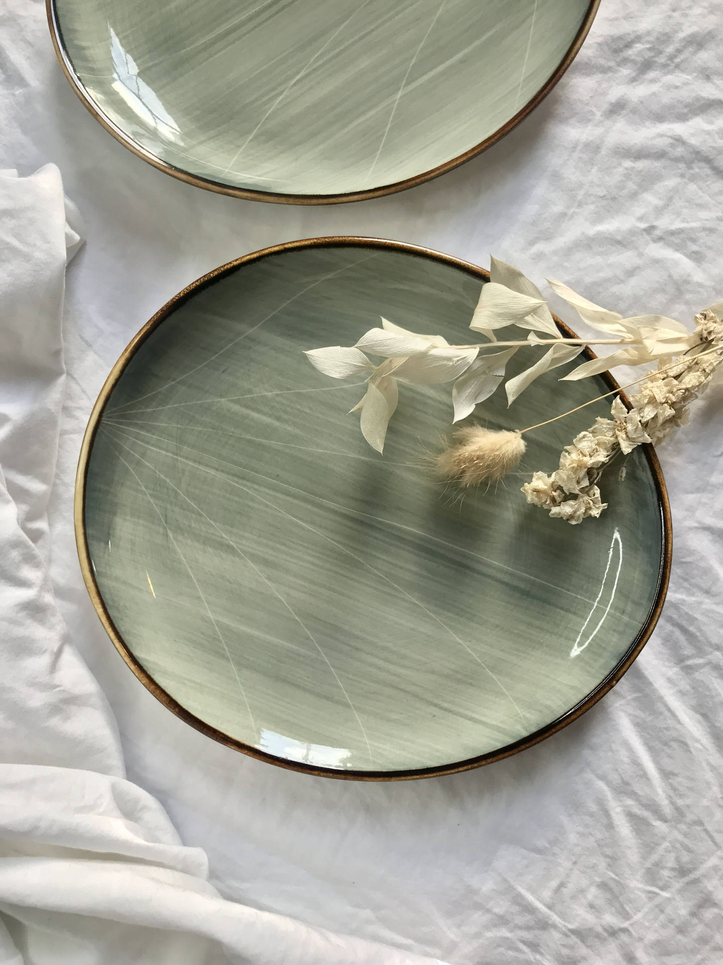 Sage Green Plates And Dried Flowers