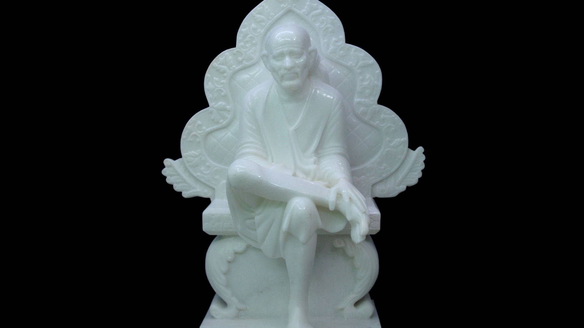Estatuade Sai Baba Hd En La Oscuridad. Fondo de pantalla