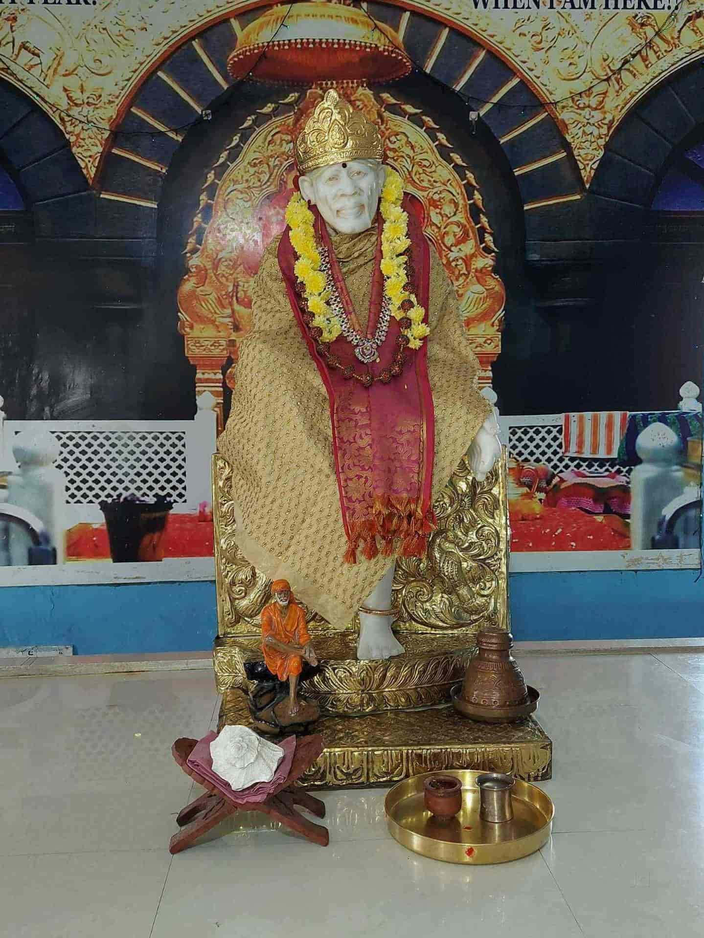 Sai Baba Statue Yellow Garland Picture