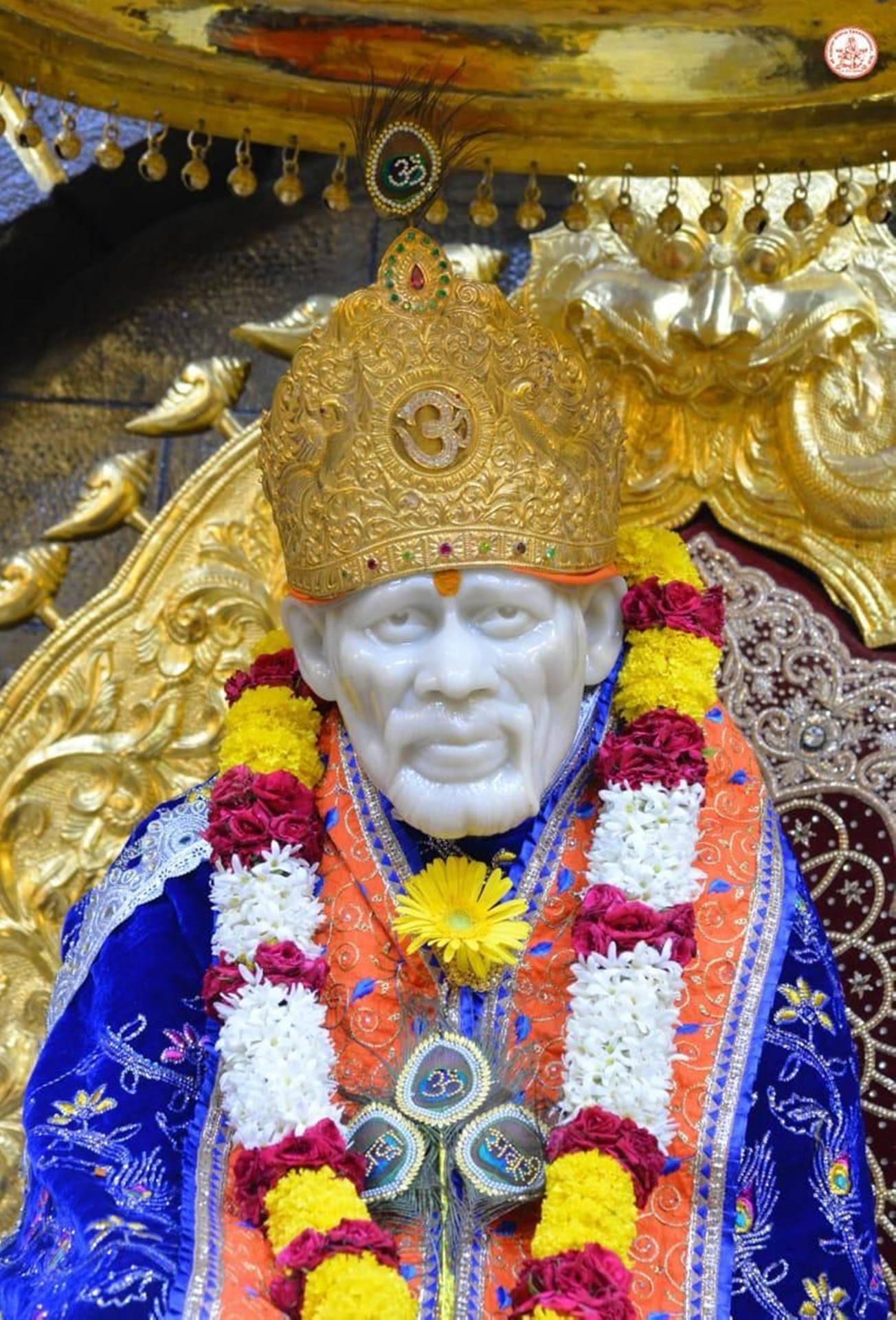 Download Sai Baba Saint Statue Dressed In Blue 4k Wallpaper 