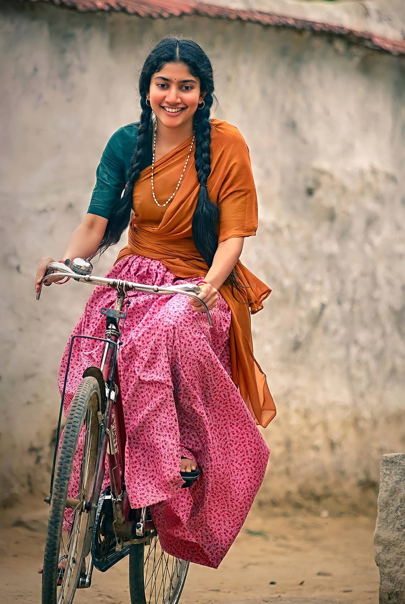 Sai Pallavi On Bicycle Background