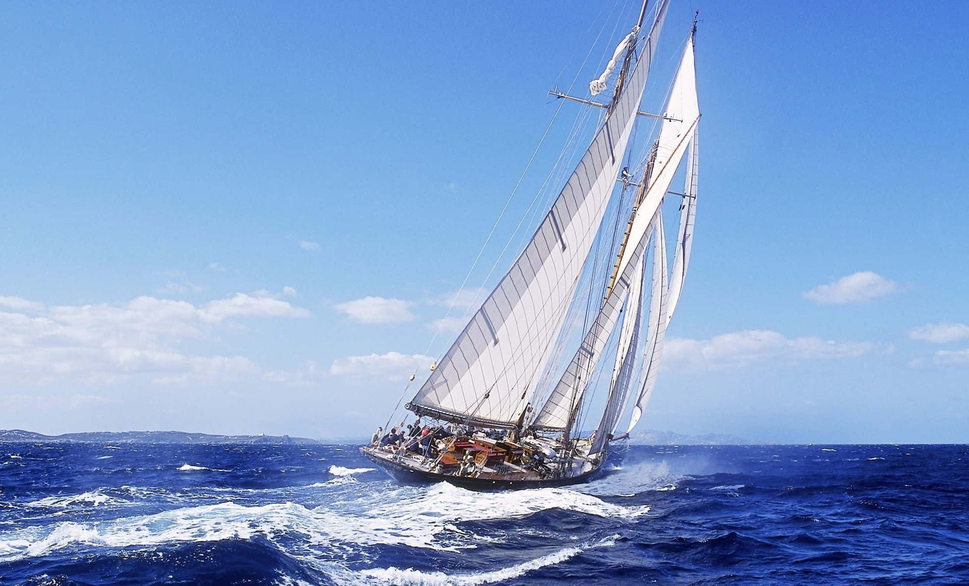Image  A majestic sailboat gliding across the open ocean