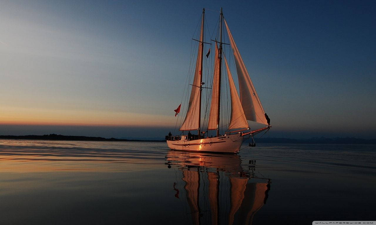 Sailing White Boat In The Distance Wallpaper
