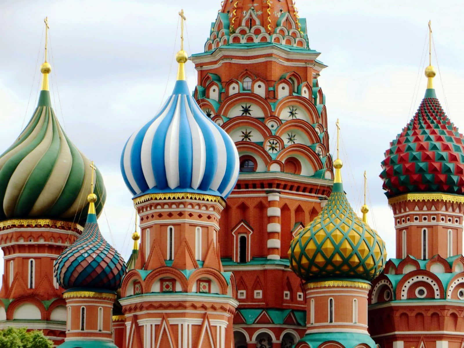 Saint Basil's Cathedral Steeples With Festive Colors And Shapes Wallpaper
