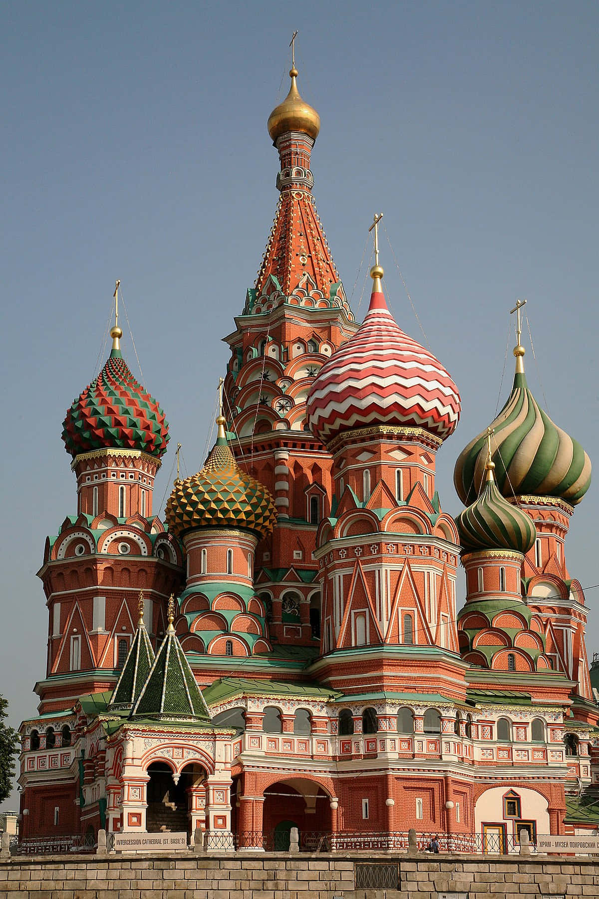 Majestic view of Saint Basil's Cathedral with intricate tented roof steeples Wallpaper