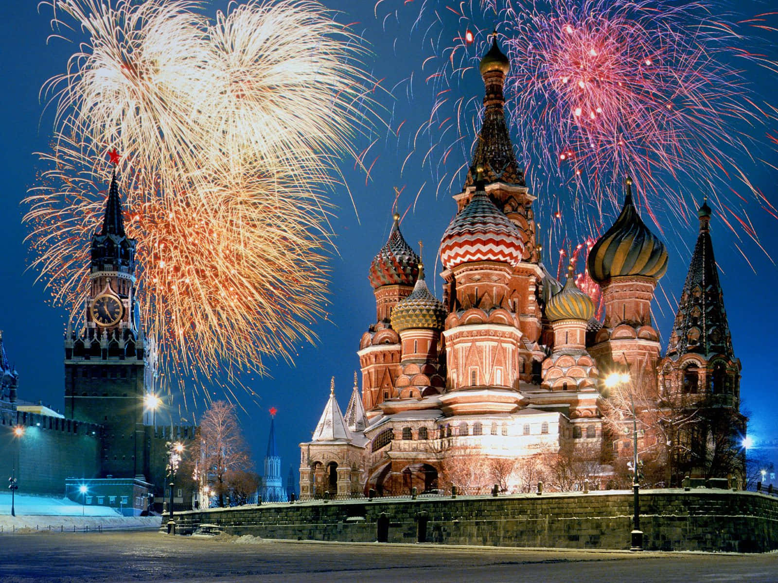 "The Saint Basil's Cathedral Illuminated by Fireworks Display" Wallpaper