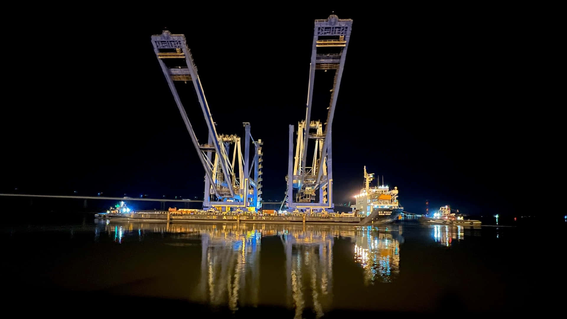 Download Saint John Port Night Reflections Wallpaper | Wallpapers.com