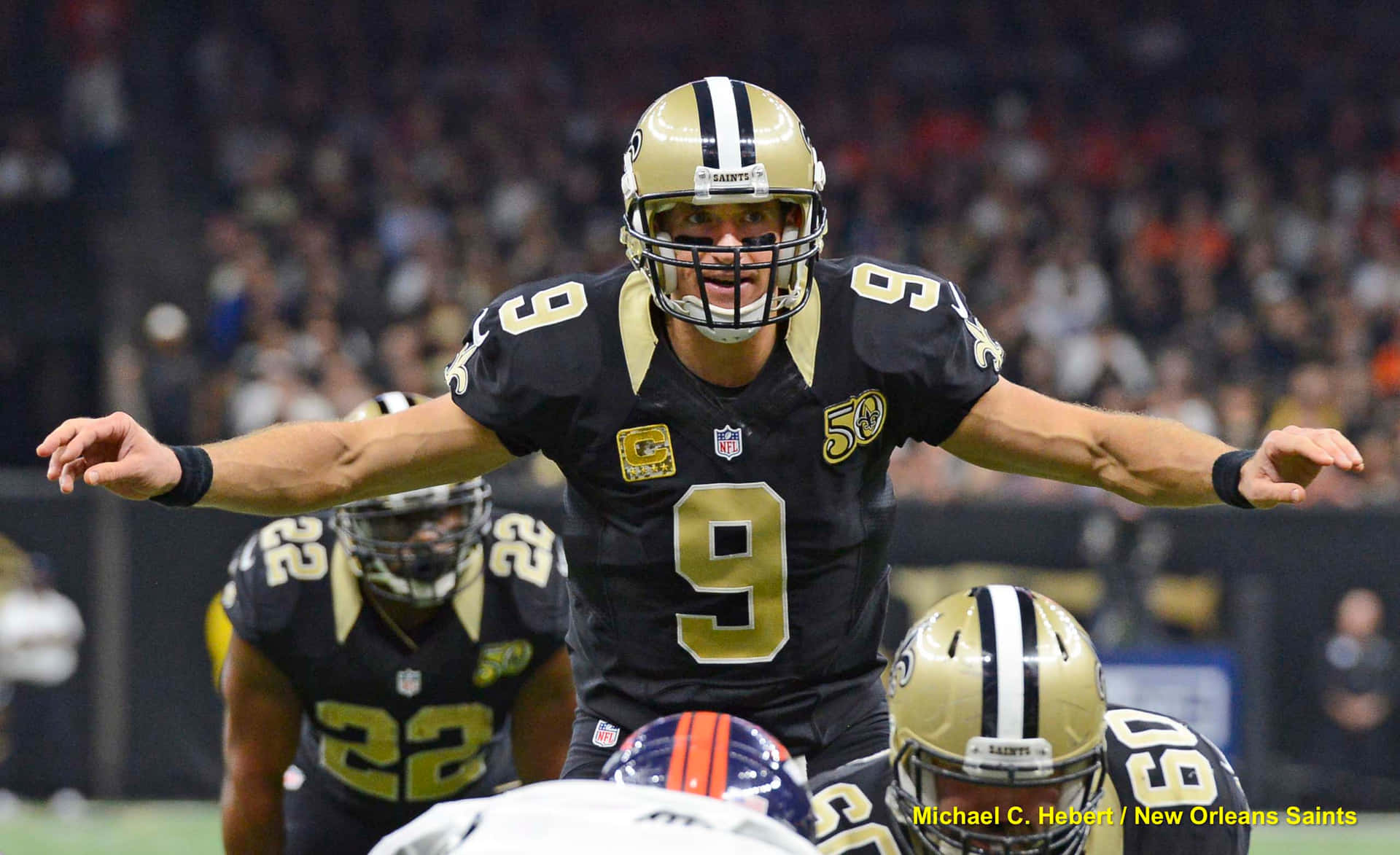 Saints celebrating after their record-breaking performance.