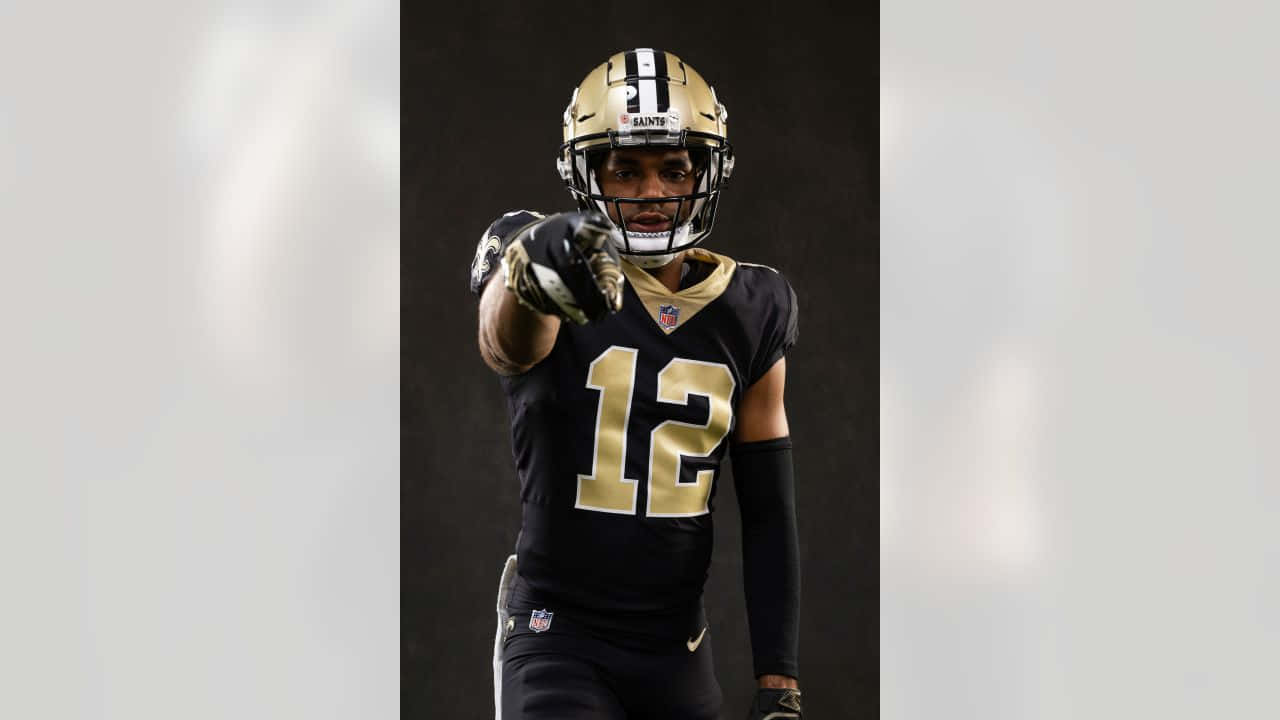 Saints Player Pointing During Game Wallpaper