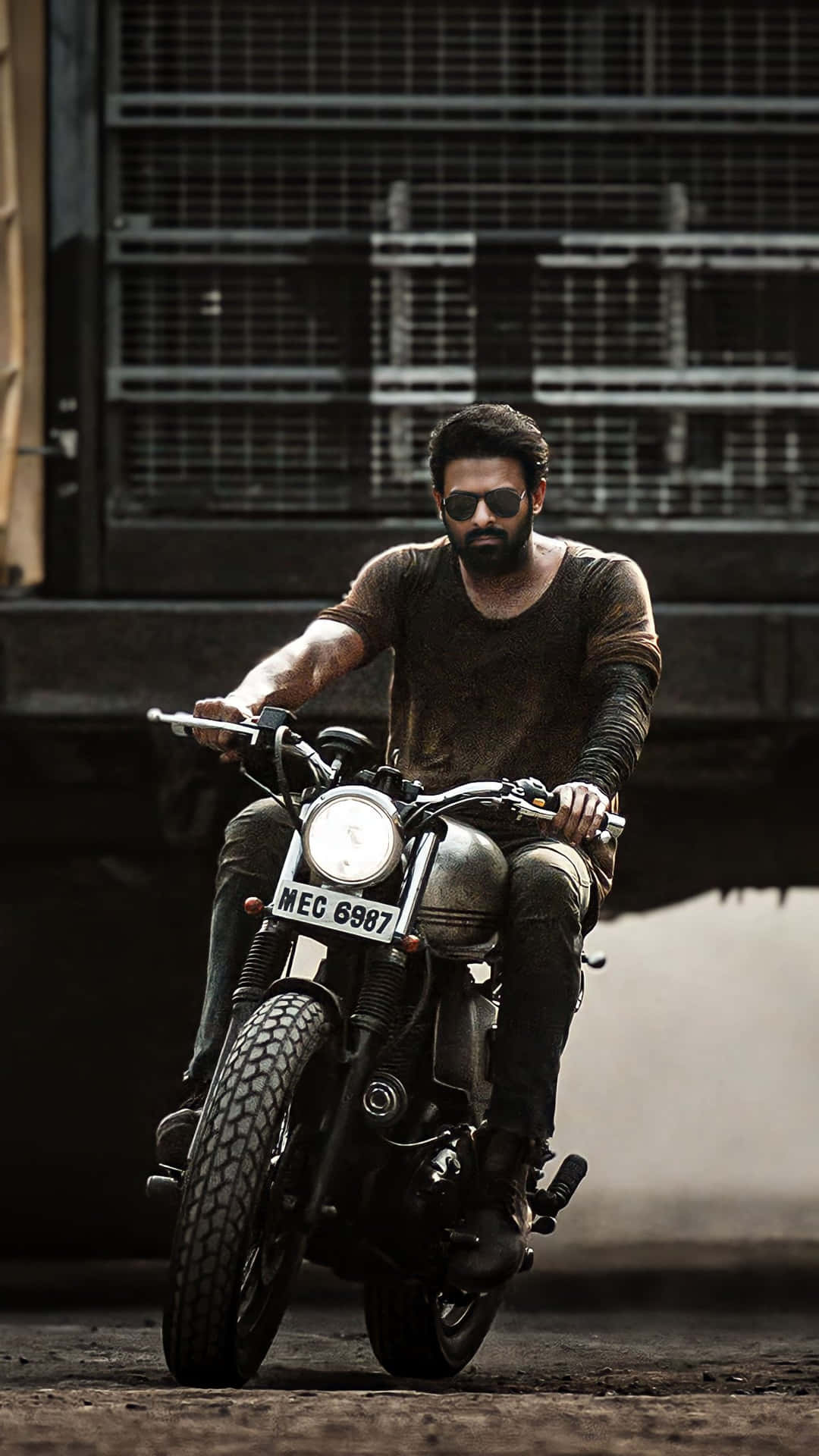 Salaar Movie Motorcycle Scene Wallpaper