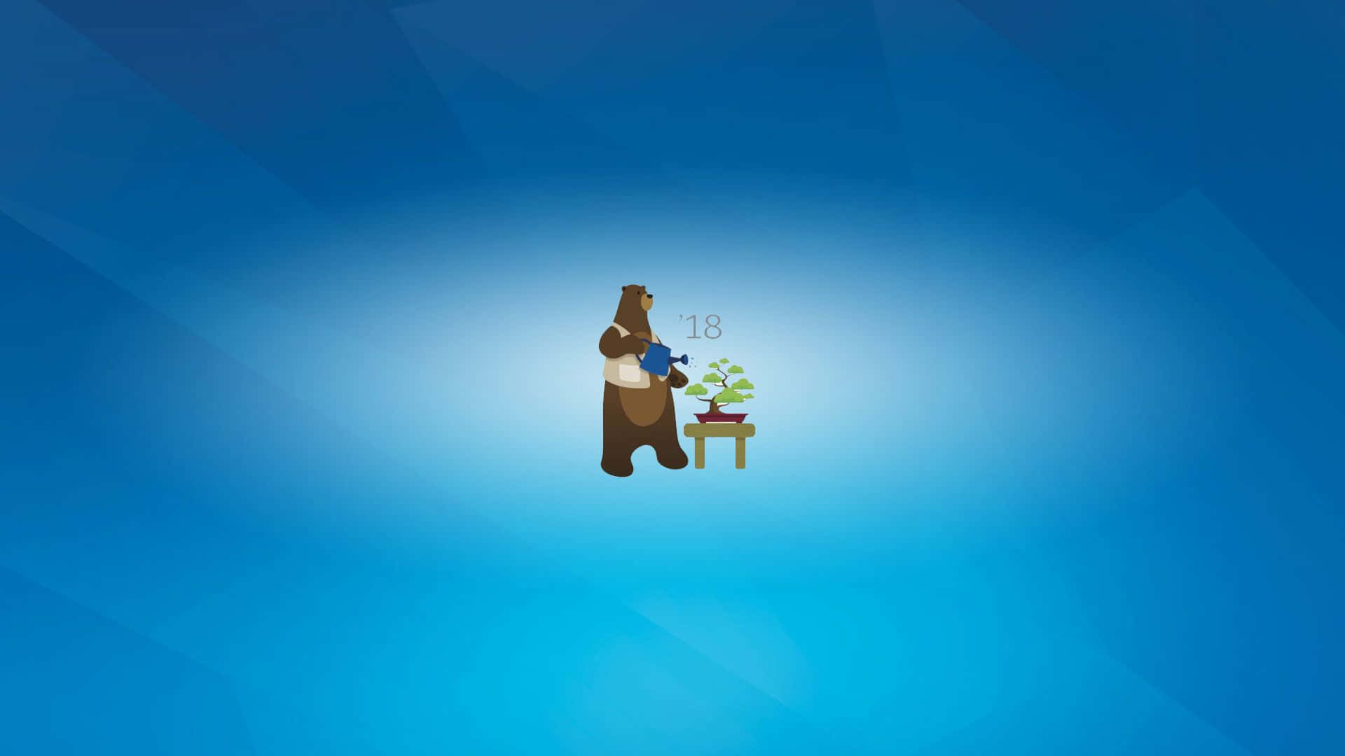 En bjørn sidder på en blå baggrund Wallpaper