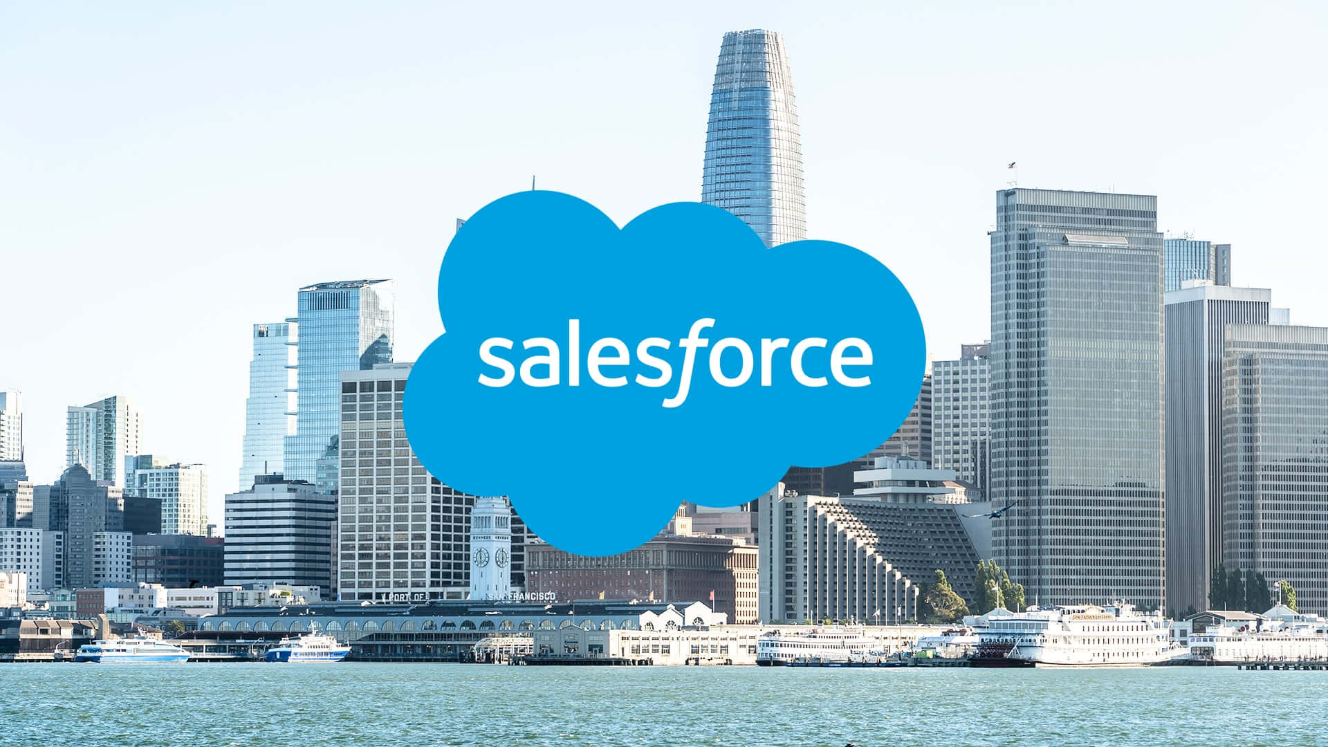 Et salesforce logo med en storby silhuet som baggrund. Wallpaper