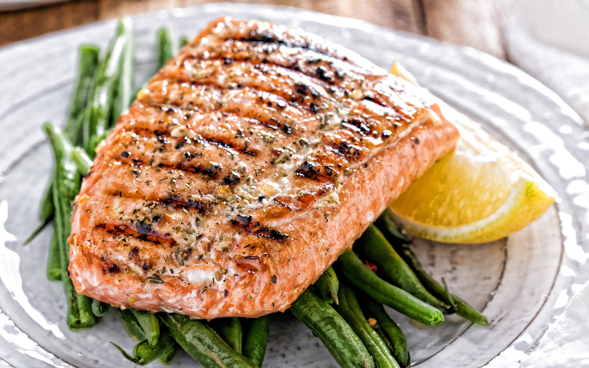 Salmon Grilled With Asparagus And Lemon On White Plate Wallpaper