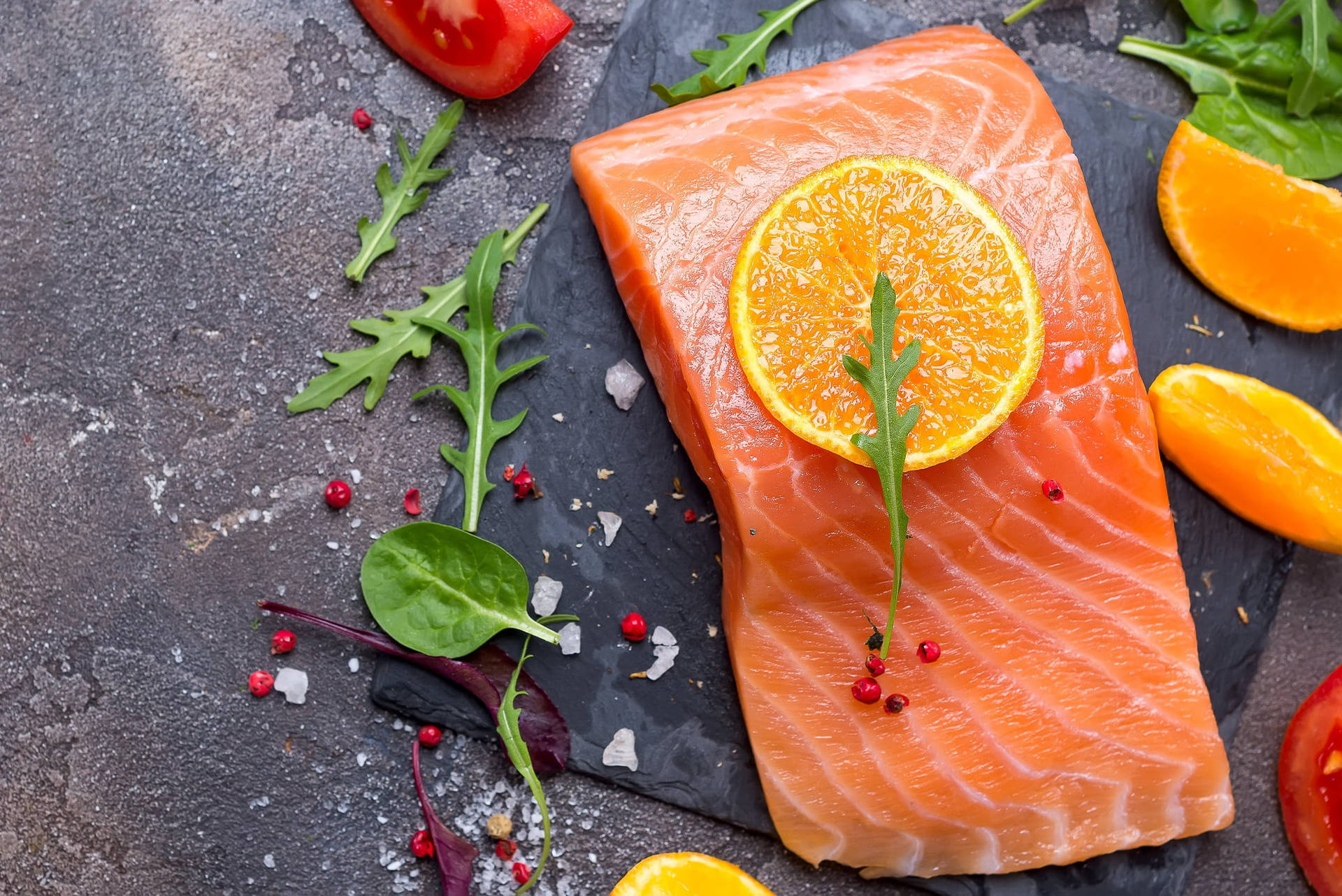 Salmon Uncooked Herbs And Orange Slices Wallpaper