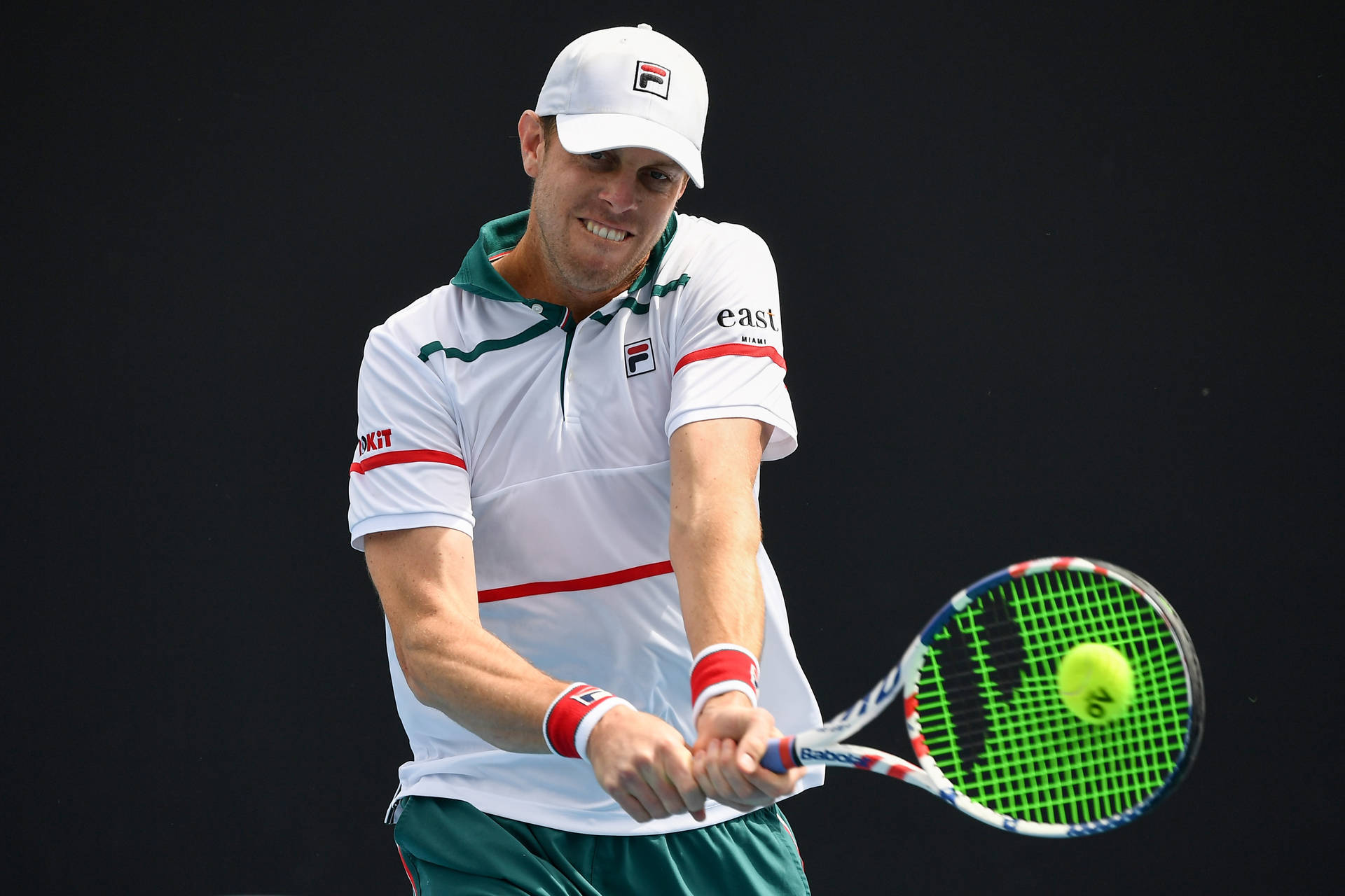 Sam Querrey Performing Iconic Backhand Stroke in Tennis Wallpaper
