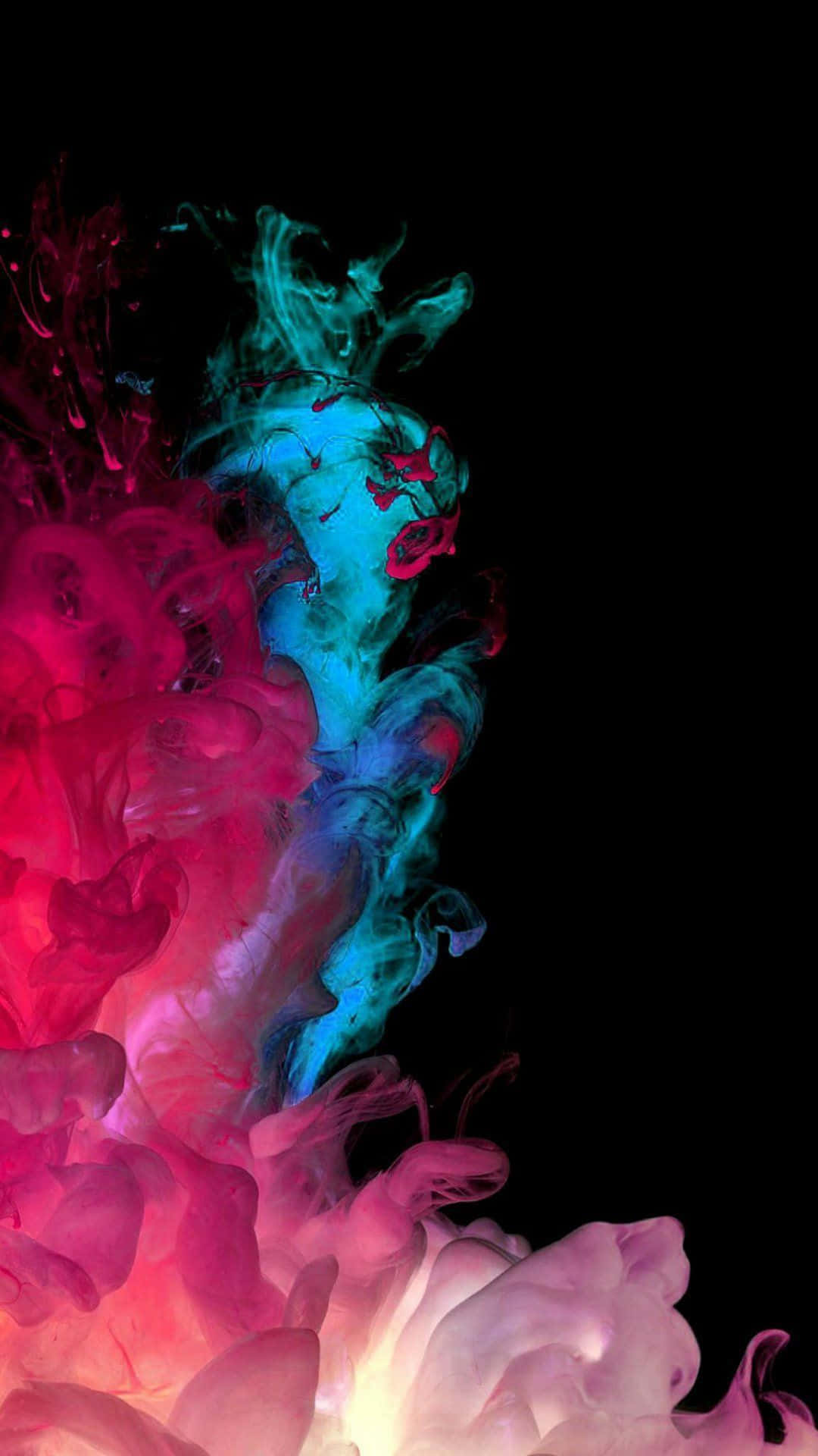 A Colorful Liquid Is Floating In The Air Wallpaper