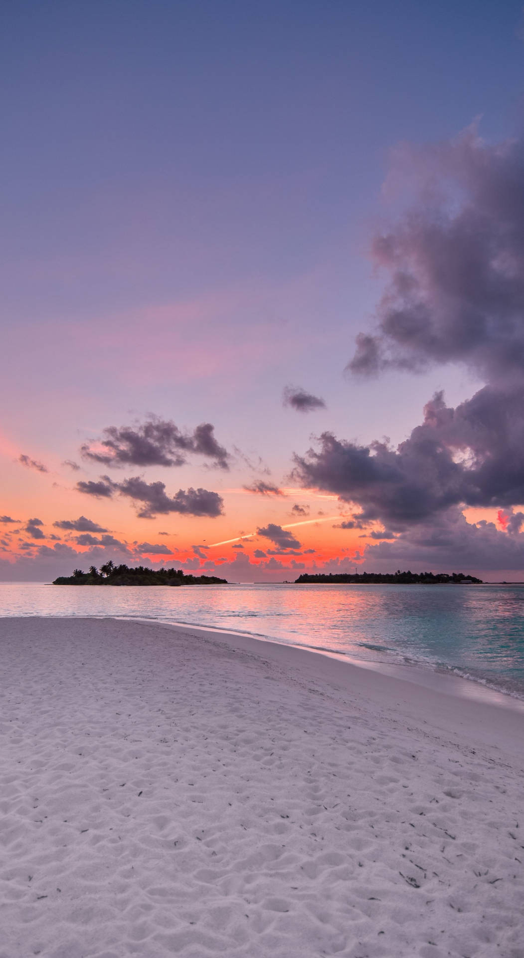 Samsung Galaxy J7 Strand Scene Tapete: Se et fantastisk udsyn af en sandstrand ved en smuk solnedgang. Wallpaper