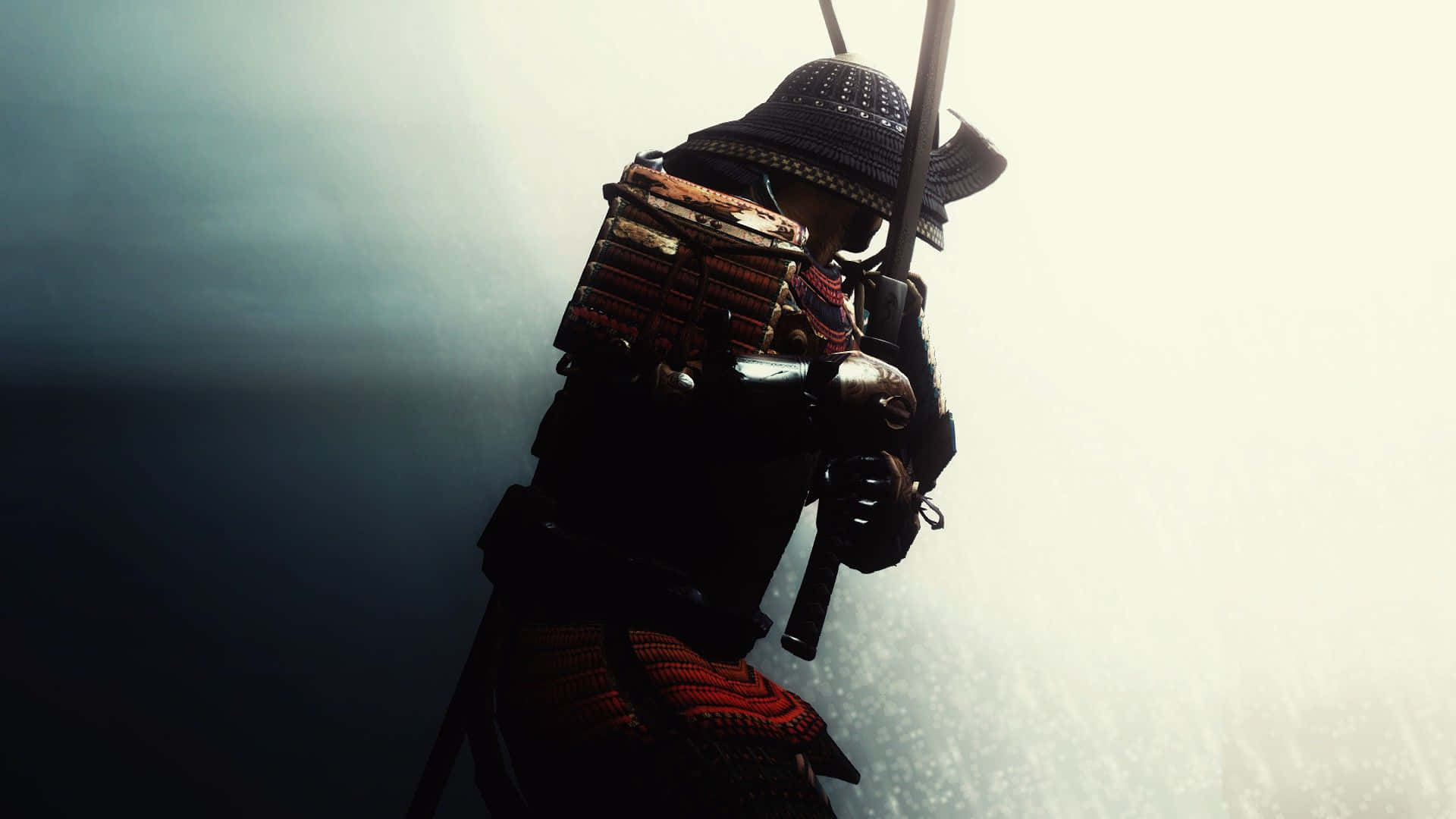 A Samurai dressed in full armor poised with a sword