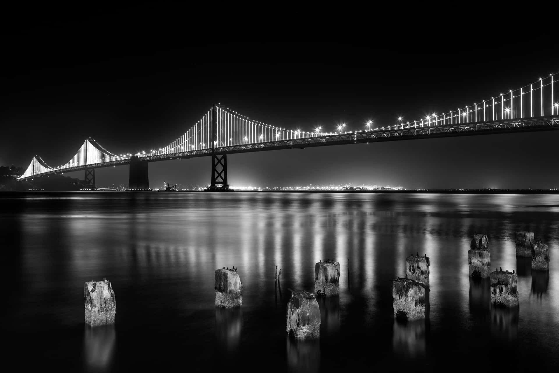 The breathtaking view of San Francisco's skyline in black and white Wallpaper