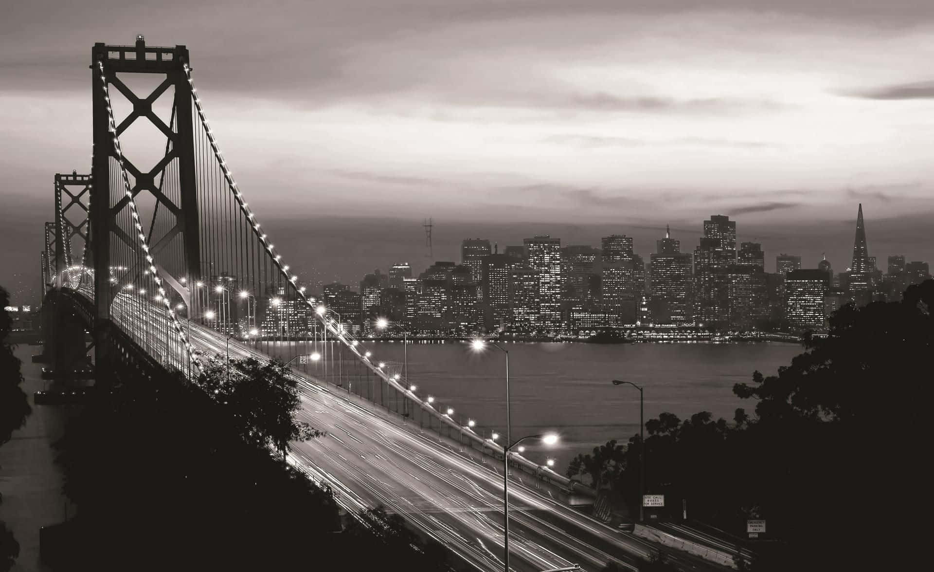The San Francisco skyline at night as seen in black and white Wallpaper