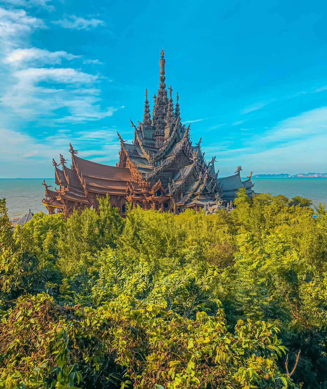 Sanctuary Of Truth Towering Over The Forest Trees Wallpaper