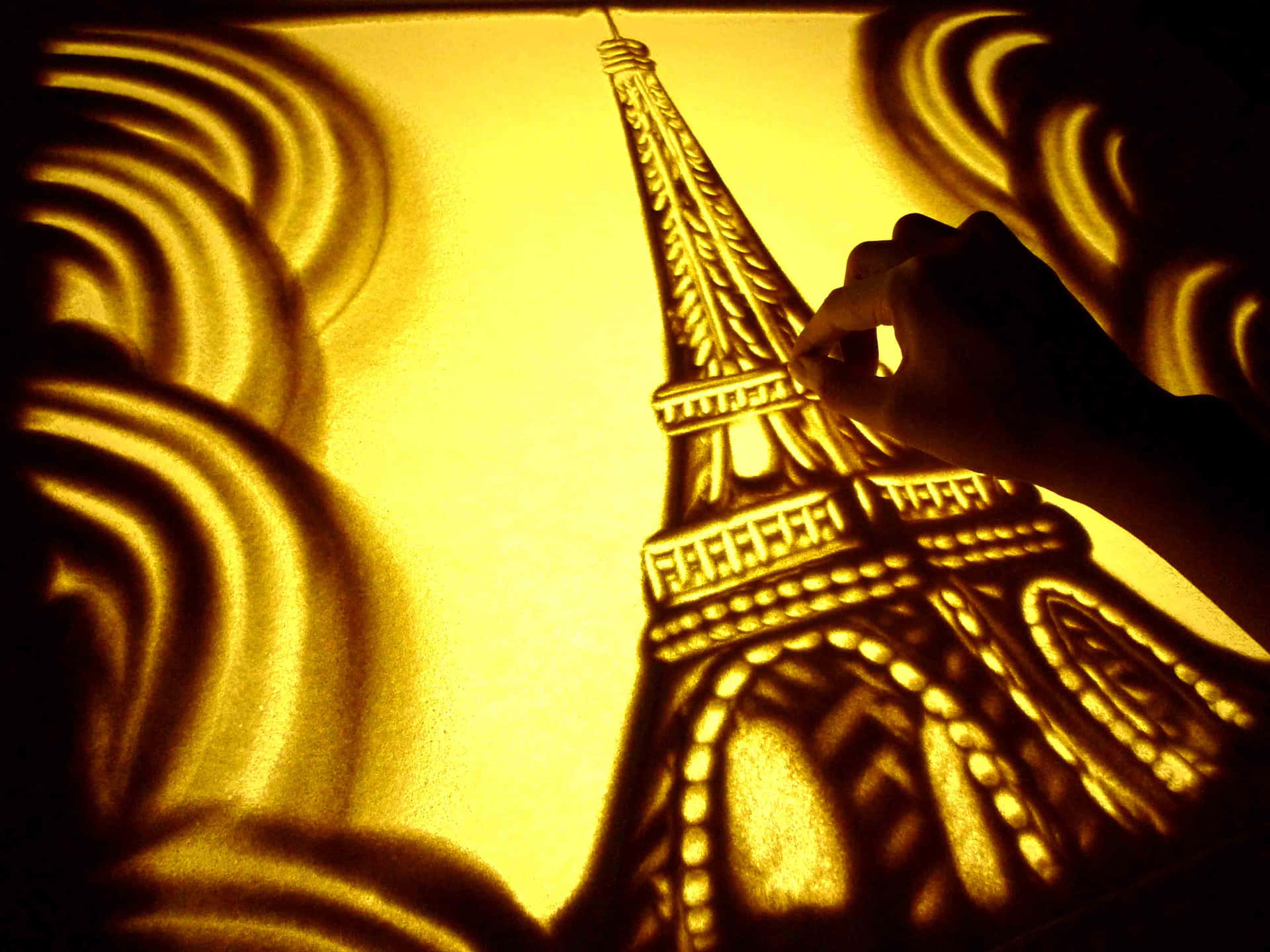 A Person Is Drawing A Shadow Of The Eiffel Tower