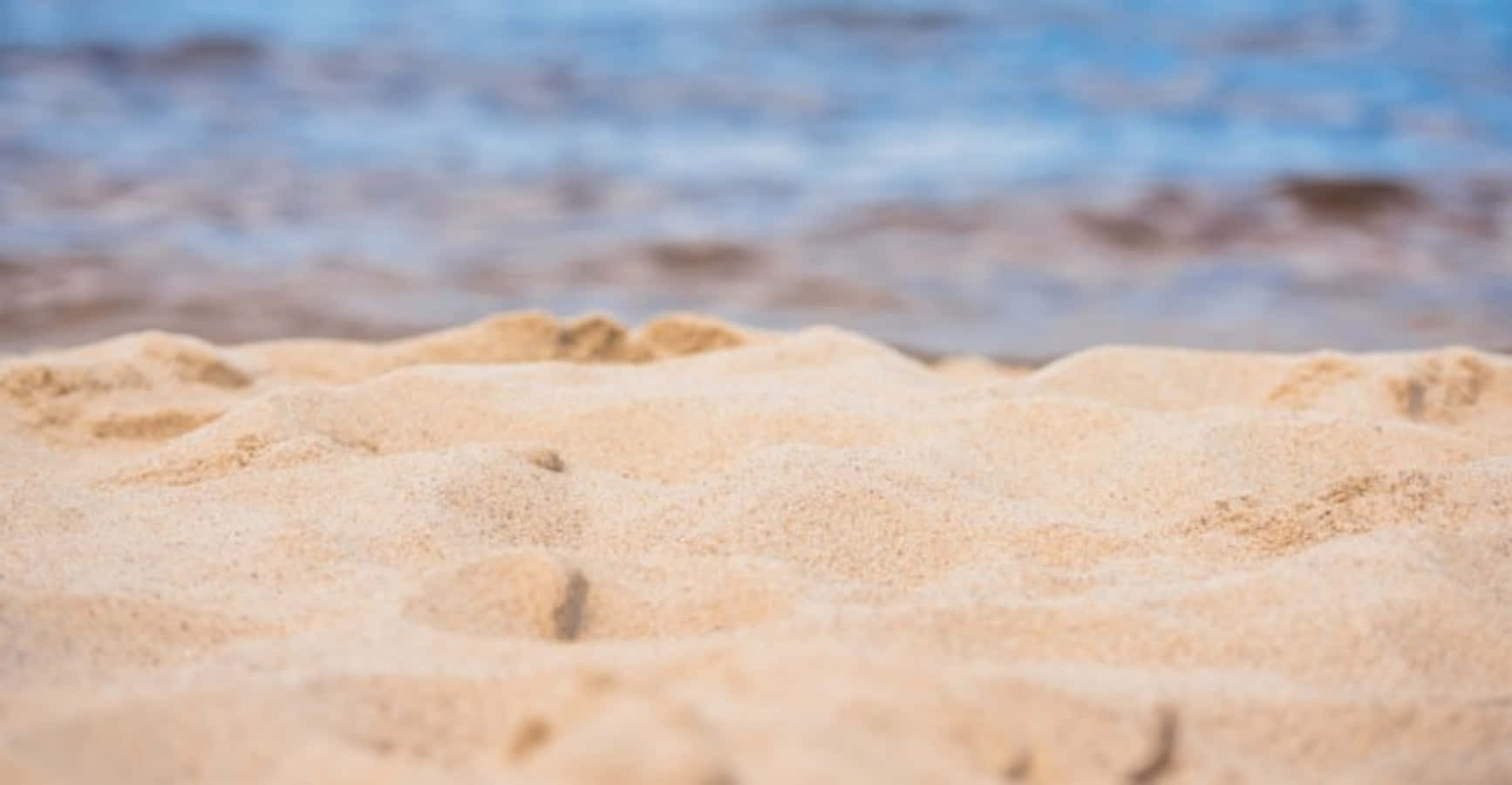 Dünenaus Sand - Makrobild