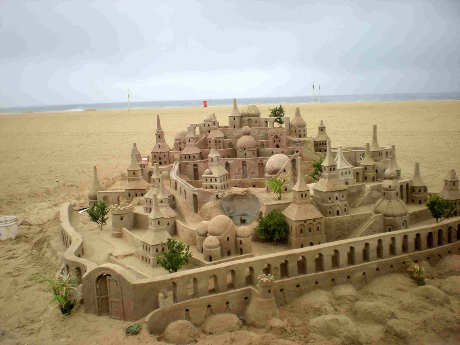 A Dreamy Beach Day with Magical Sandcastles Wallpaper
