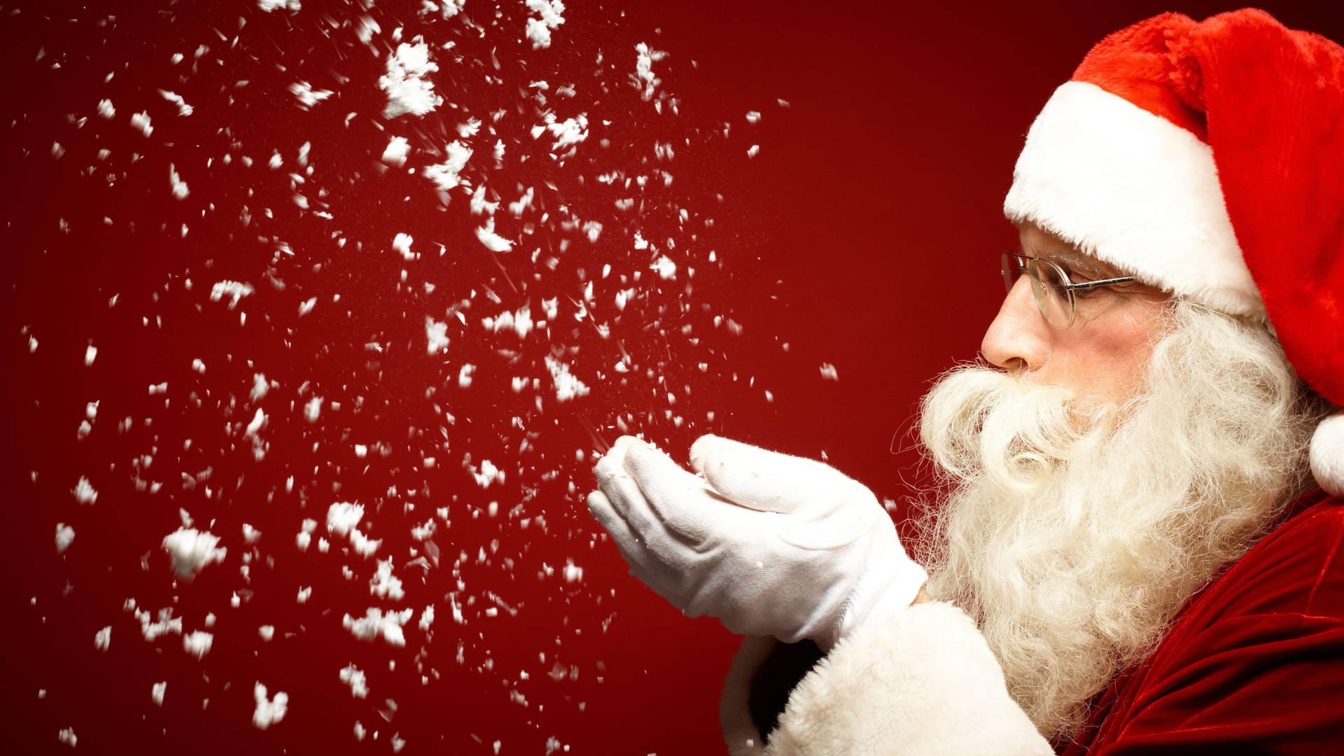 Santa Claus Blowing Snow