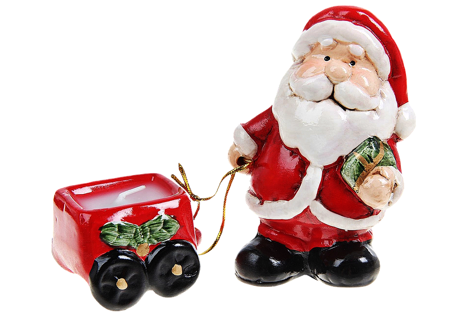 Santa Claus Figurinewith Toy Wagon PNG