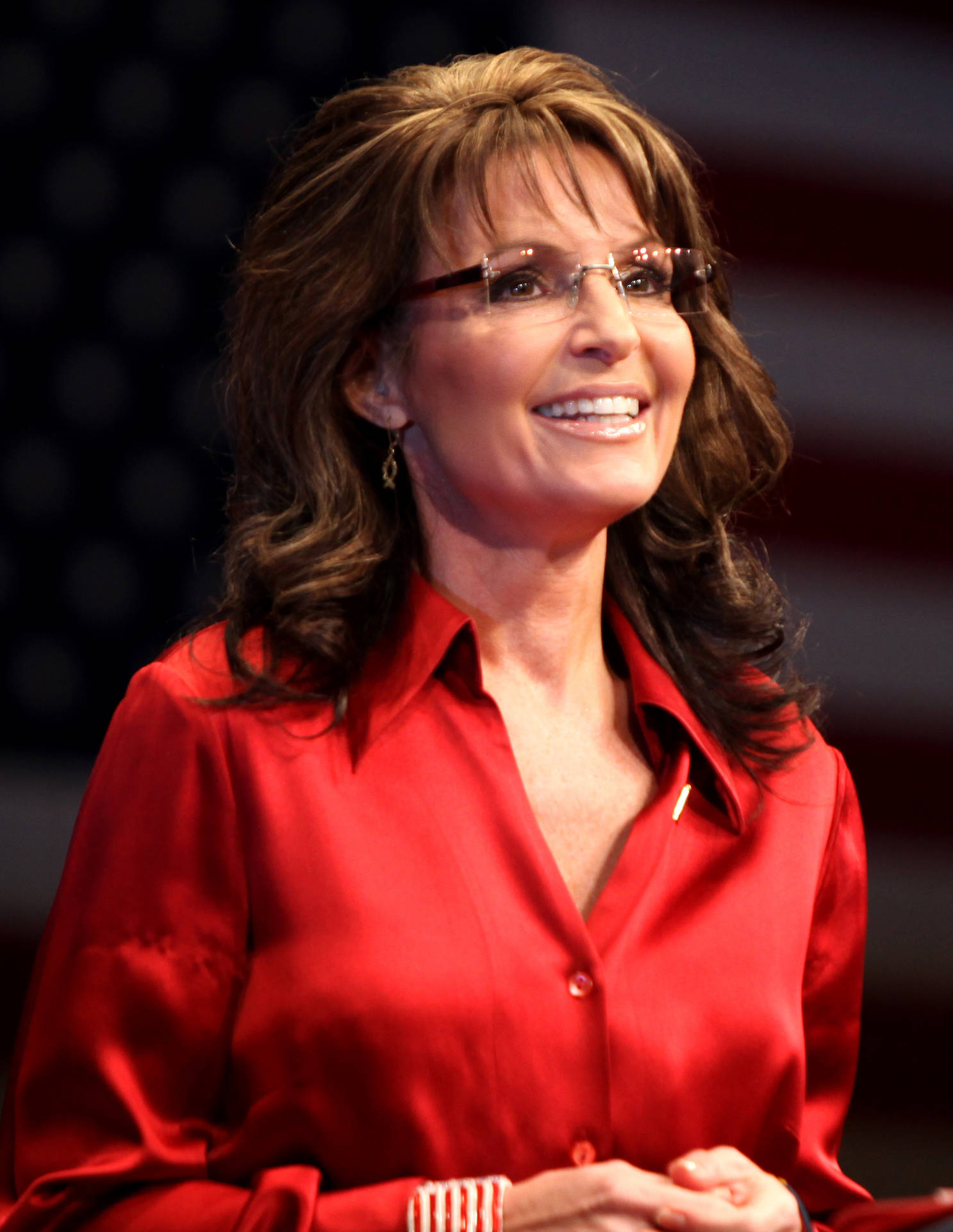Sarah Palin With Blurry Flag Background Wallpaper