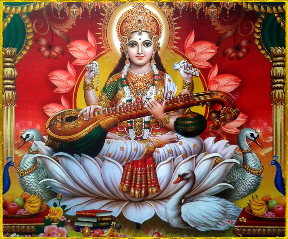 Saraswati Devi Sits Red Wallpaper