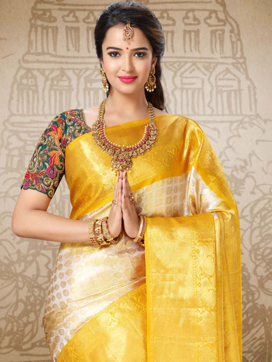 A Beautiful Woman In A Yellow Sari