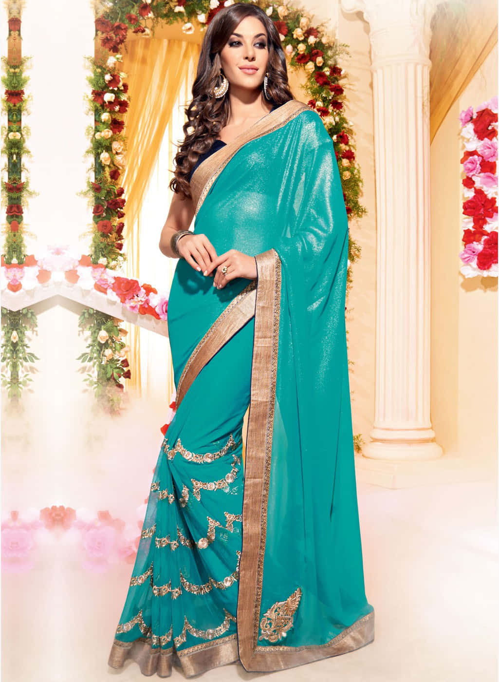 A Beautiful Woman In A Turquoise Sari
