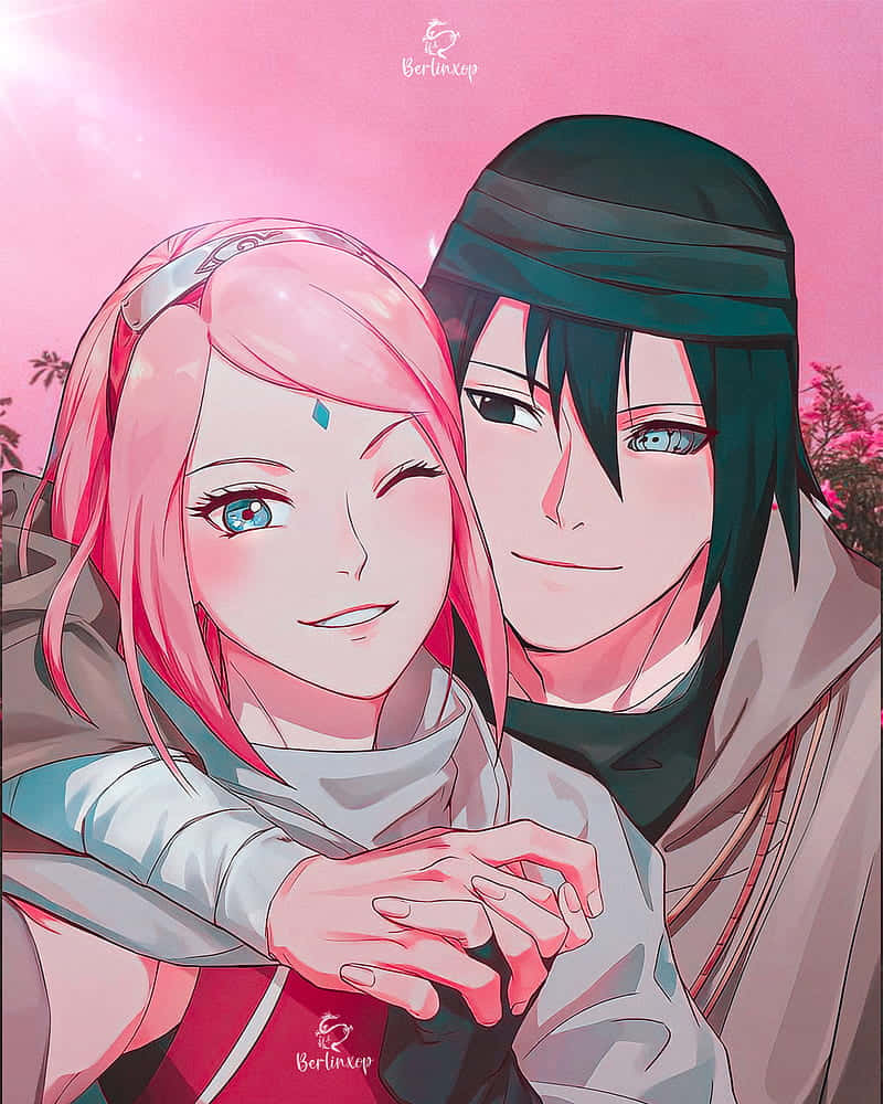 Love is in the air as Sasuke and Sakura gaze into each other's eyes. Wallpaper