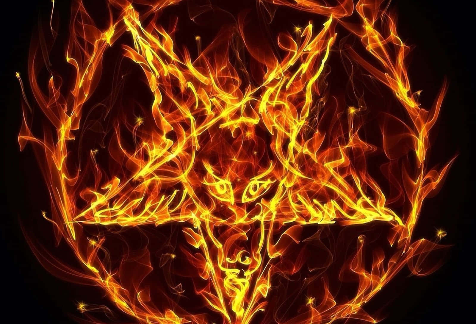 A Pentagram Symbol In Flames On A Black Background
