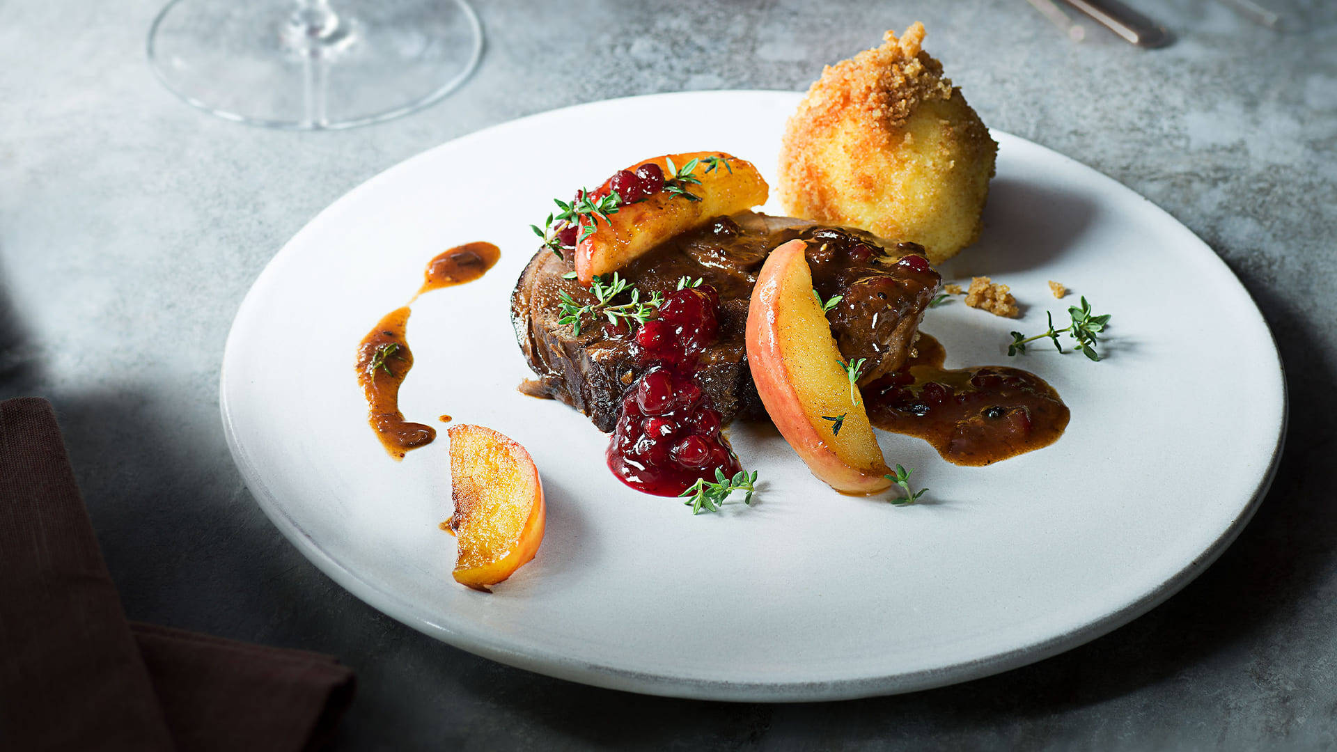 Sauerbraten - A Traditional German Dish served with Pomegranate Sauce Wallpaper