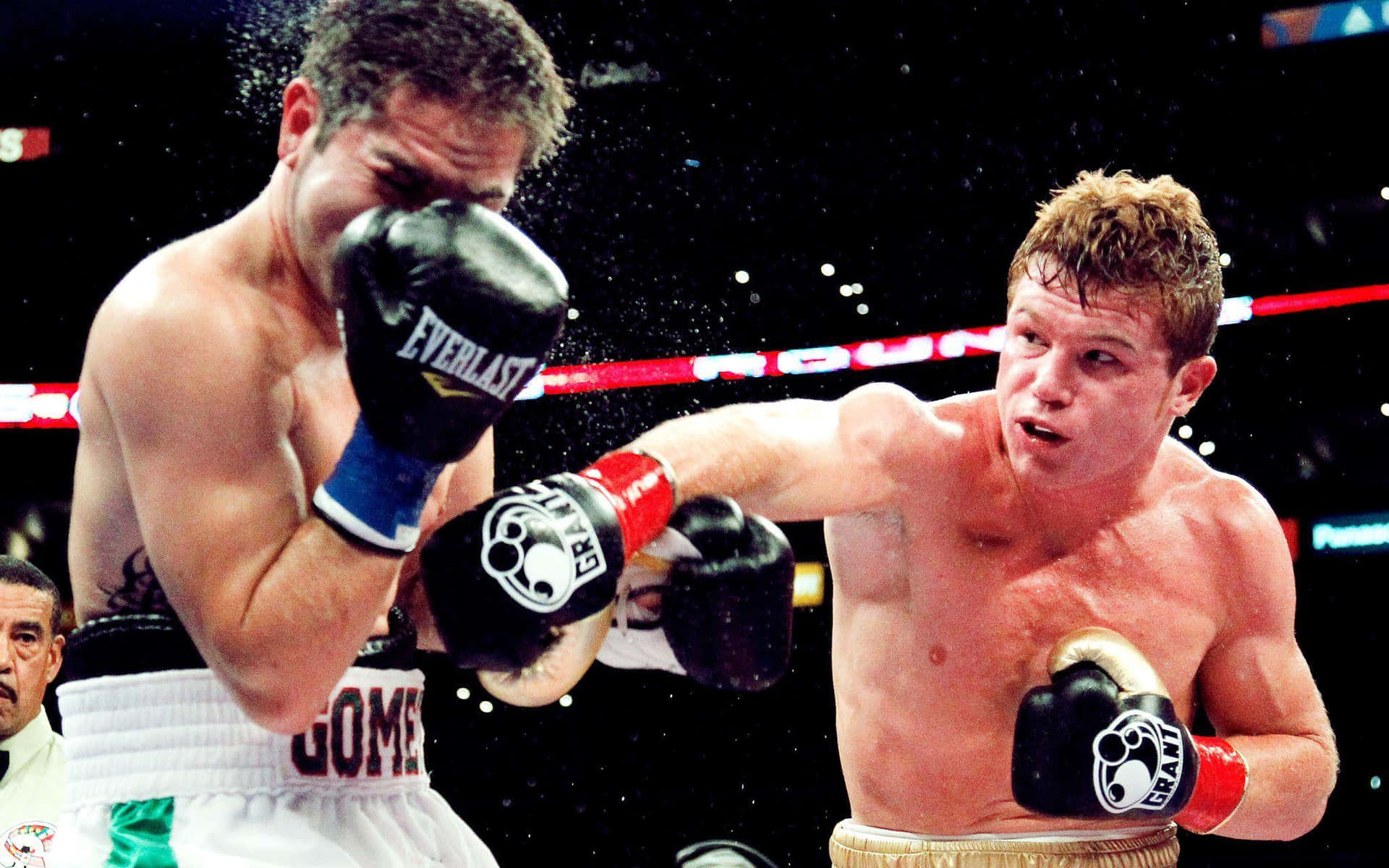Saul 'canelo' Alvarez Delivering A Powerful Punch In The Boxing Ring Wallpaper