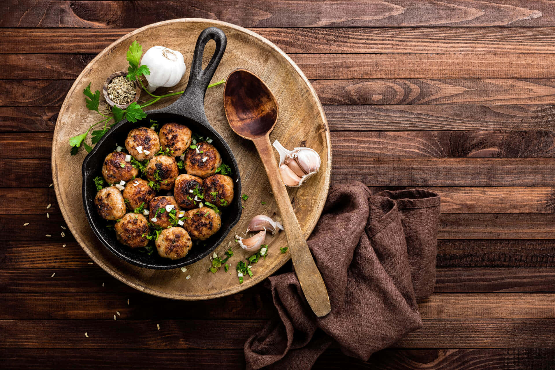 Savory Meatballsin Cast Iron Skillet Wallpaper