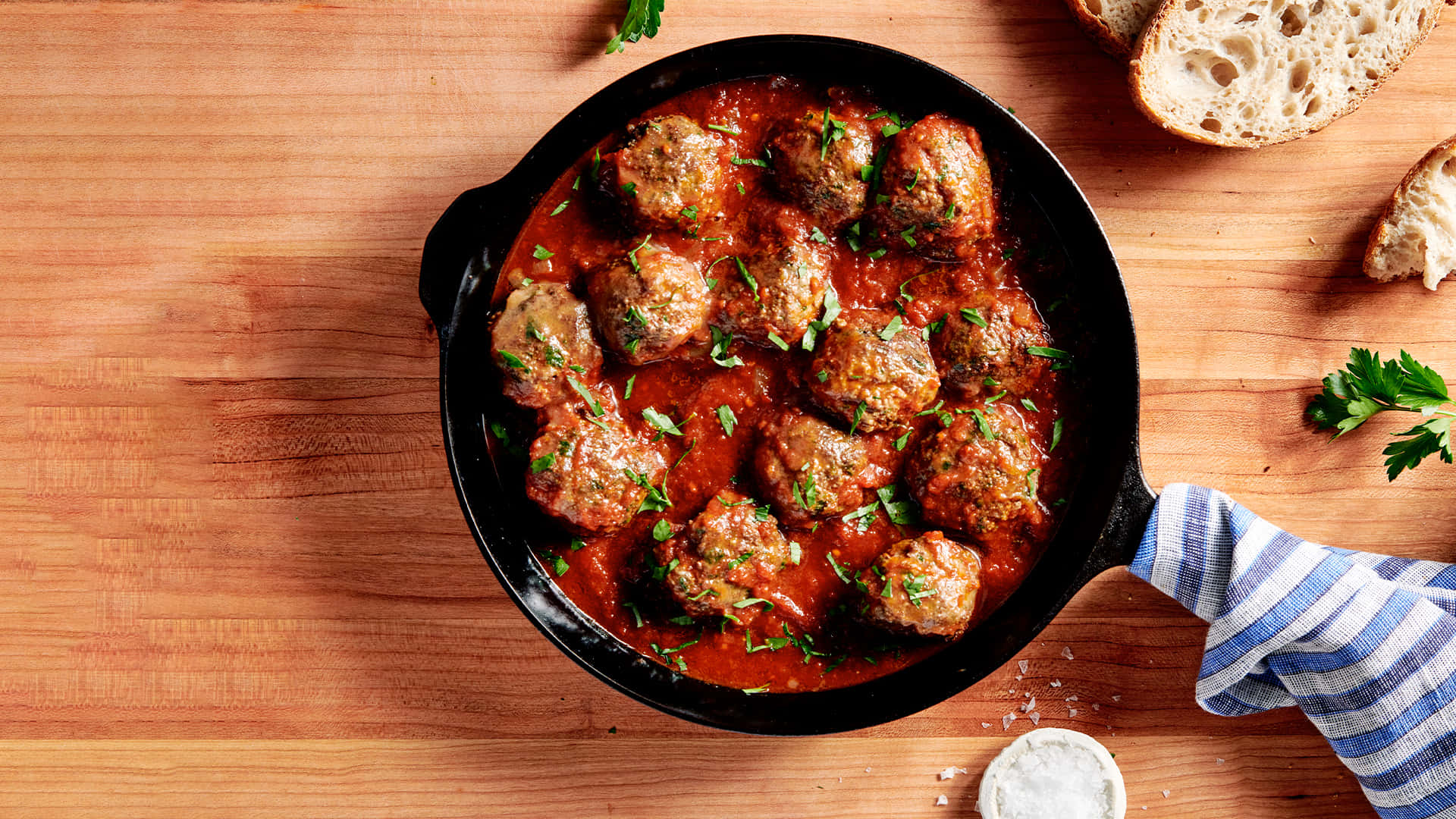 Savory Meatballsin Tomato Sauce Skillet Wallpaper