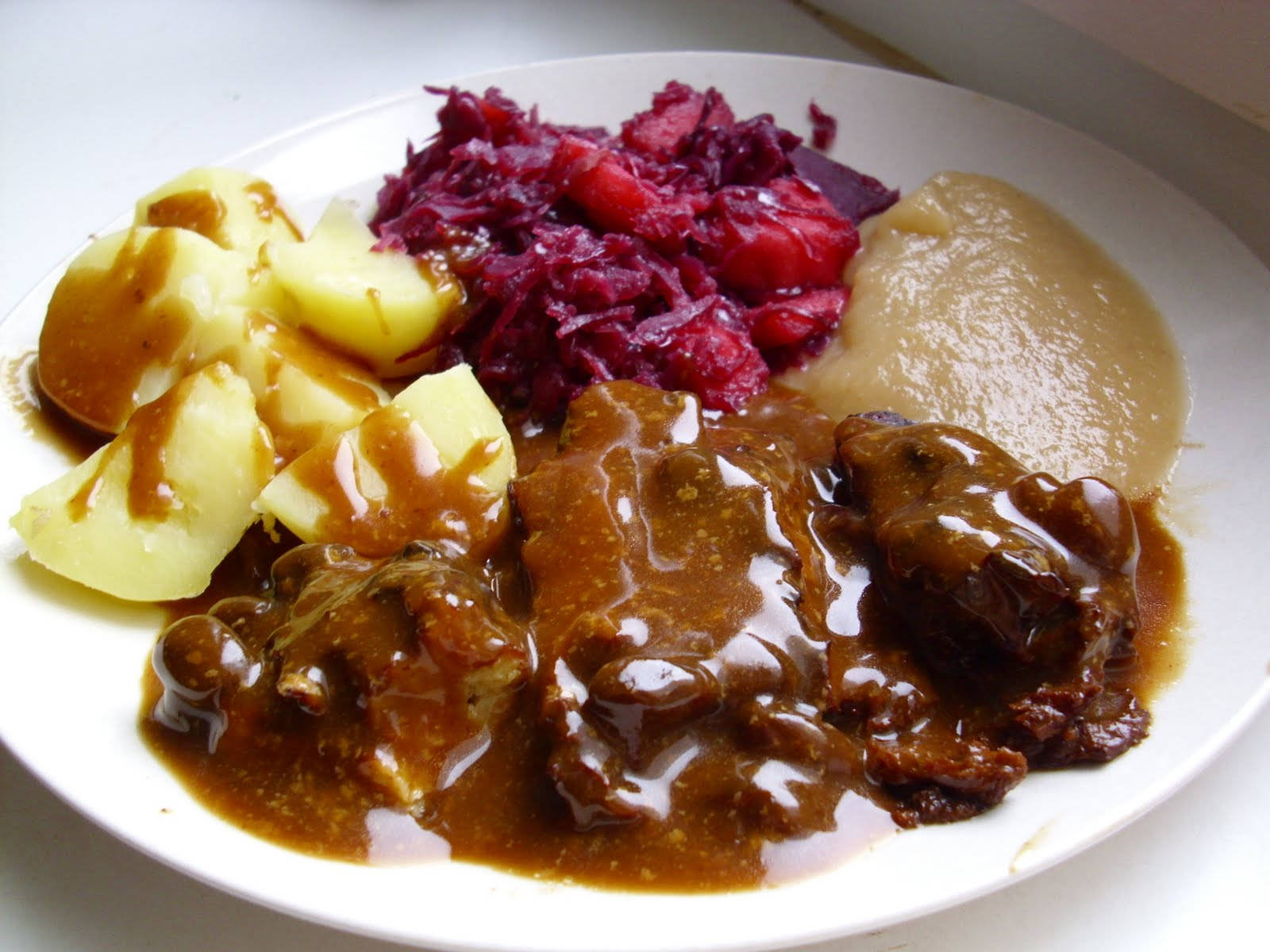 A Savory Delight of Sauerbraten - Traditional German Dish Wallpaper