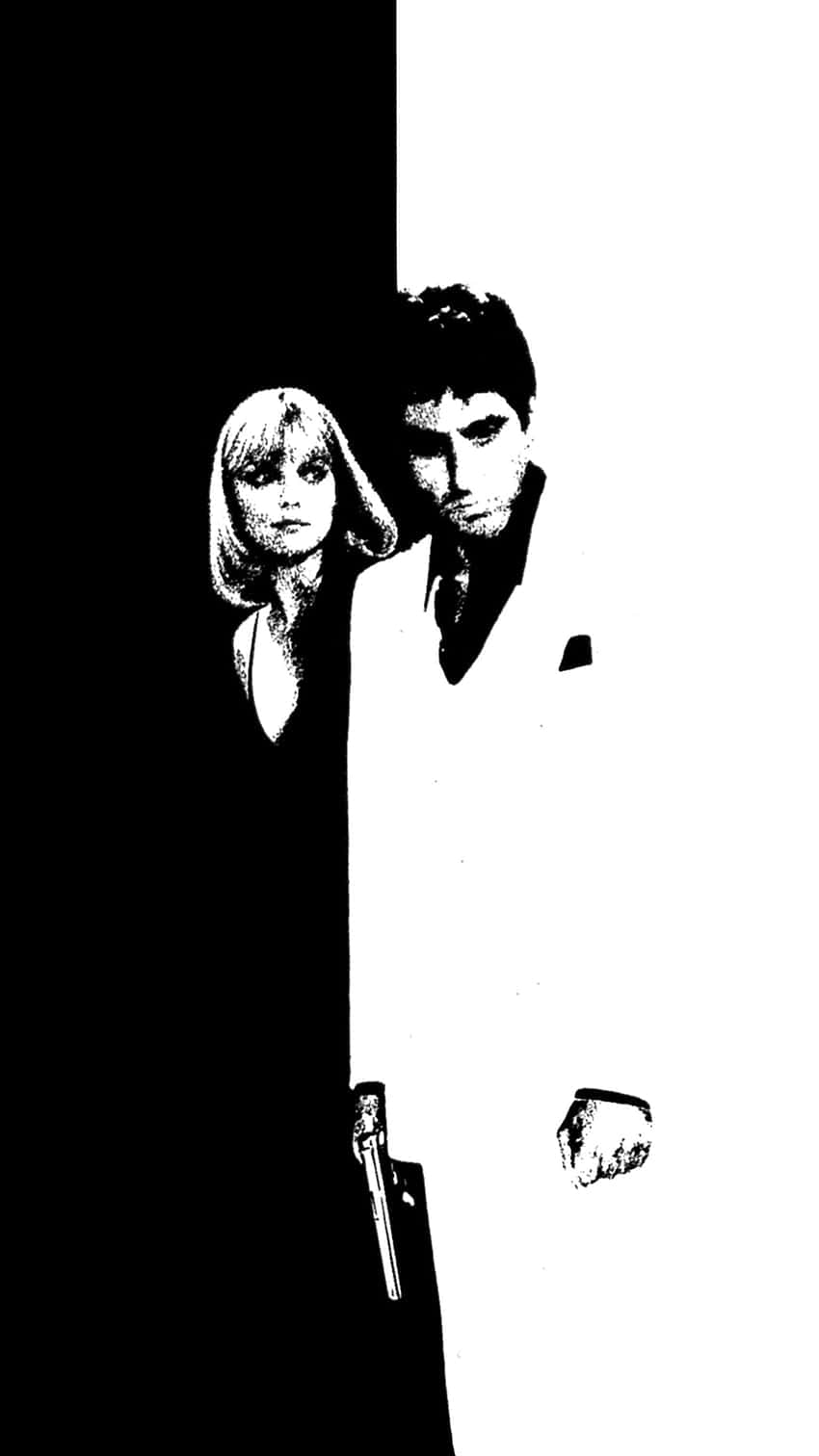 Own the gangster lifestyle with an iPhone featuring the iconic Scarface logo Wallpaper