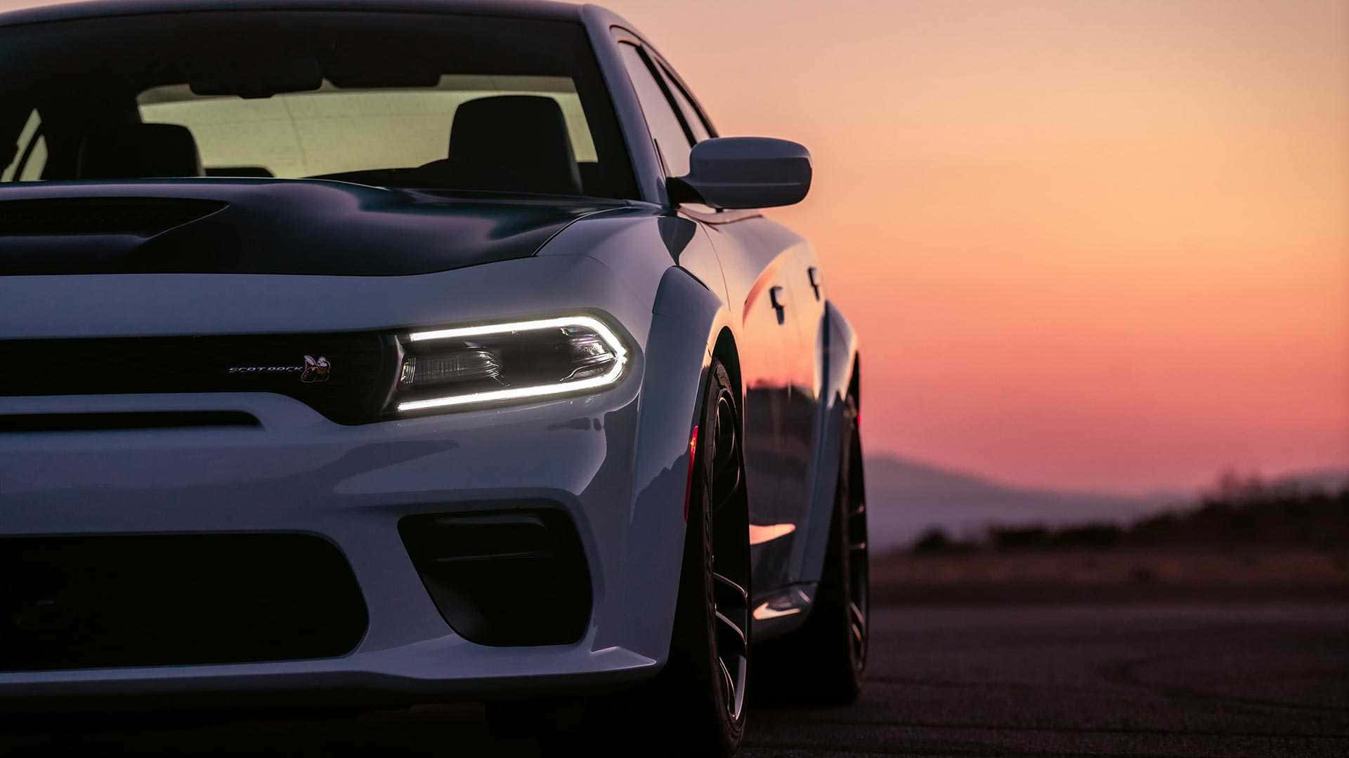 Dodgecharger Srt Is A High-performance Car With A Stunning Design. It Is Perfect For People Who Love Speed And Power. Wallpaper