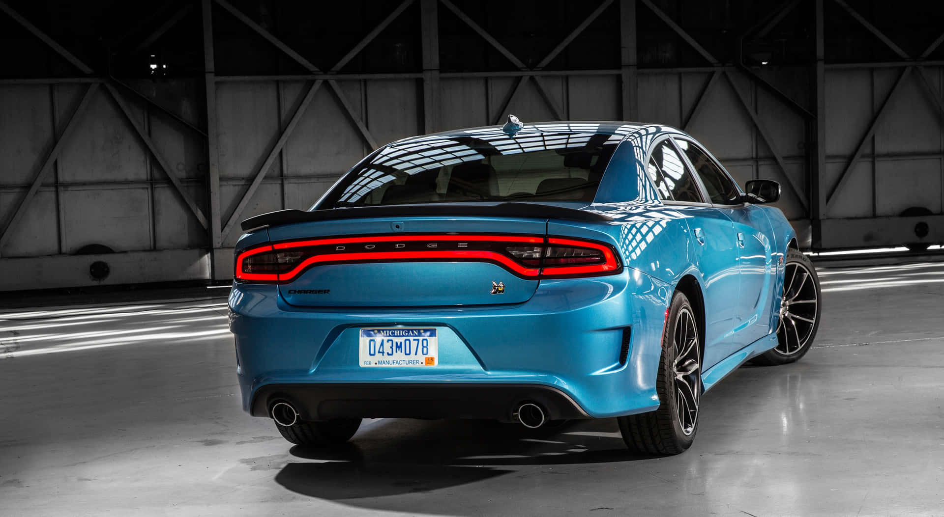 The Rear End Of A Blue Dodge Charger Wallpaper