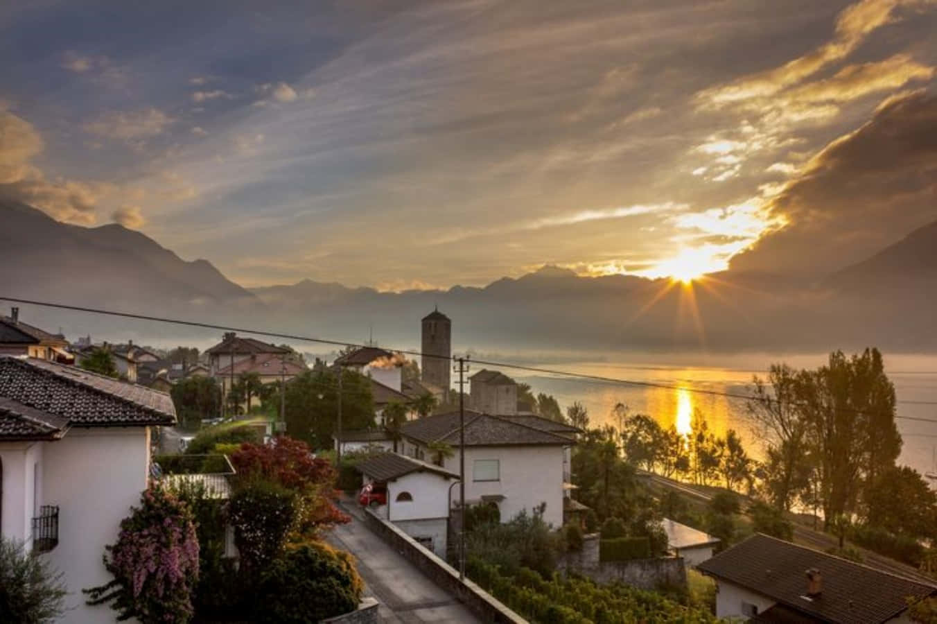 Scenic View Of Beautiful Locarno Landscape At Sunset Wallpaper