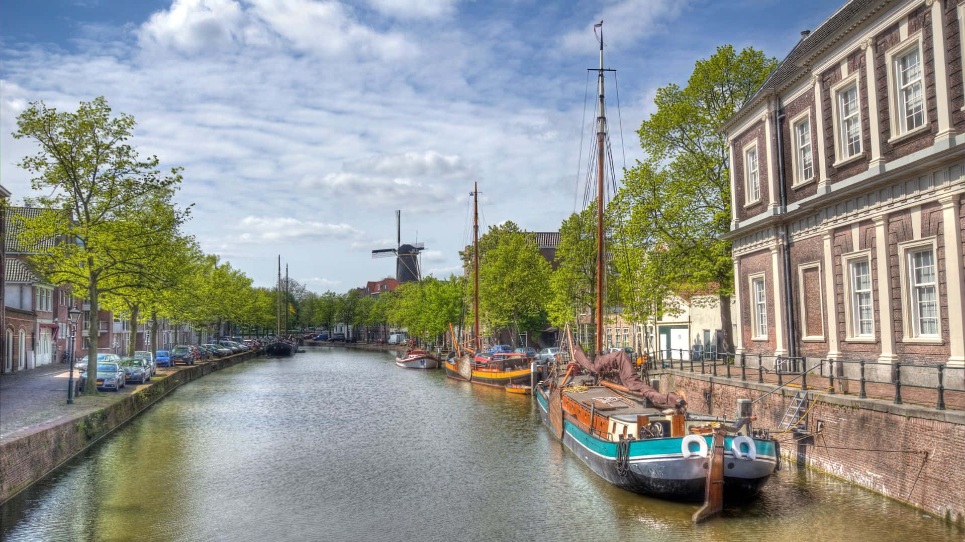 Schiedam Canal Viewwith Windmill Wallpaper