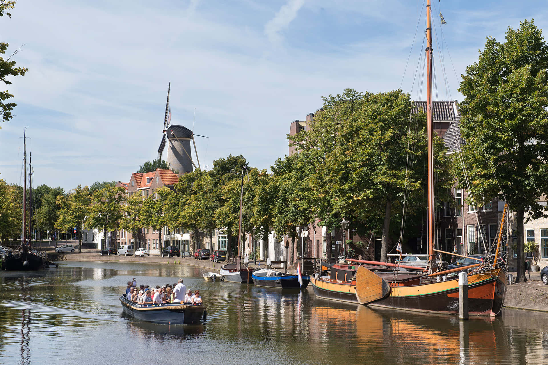 Schiedam Canal Viewwith Windmilland Boats Wallpaper